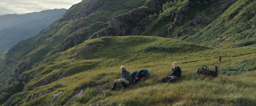 sophie carefully admires a strip of grass